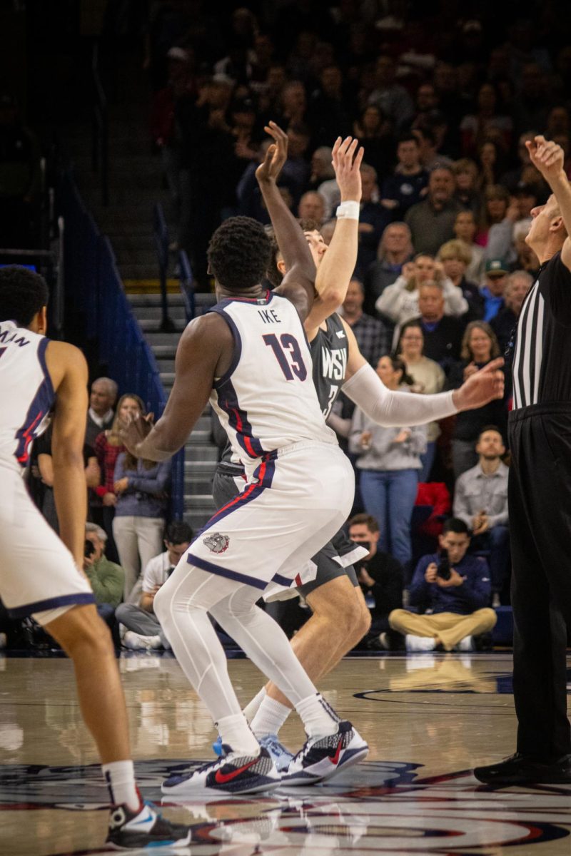 Ethan Price goes for the tipoff against Gonzaga's Graham Ike on Jan. 13, 2025.