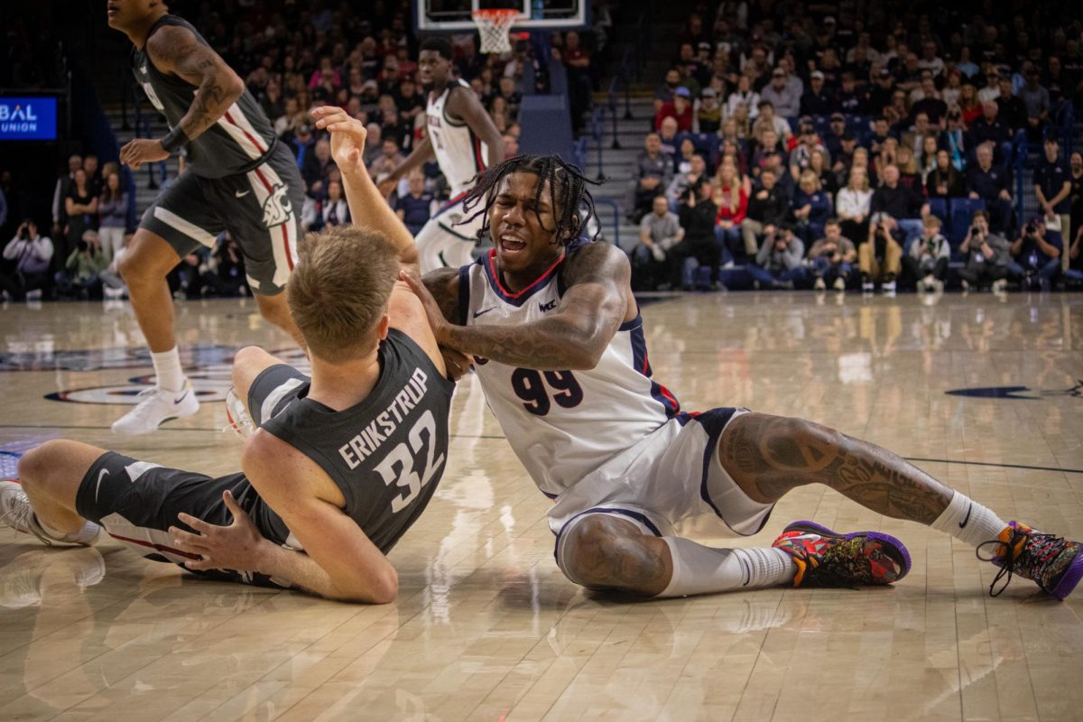 Dane Erikstrup gets in tussle with Gonzaga's Khalif Battle, Jan. 13, 2025.