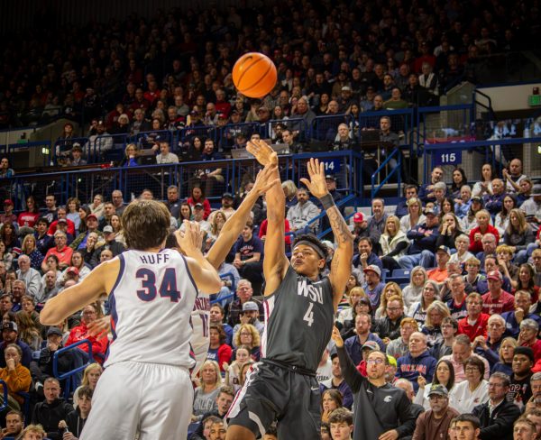 LeJuan Watts (#4) lets a three-pointer fly against the Pacific Tigers on Jan. 9, Pullman, Wash. 