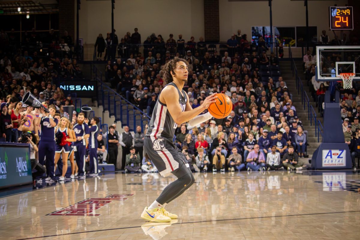 Nate Calmese preparing to shoot a three-pointer against Gonzaga, Jan. 13, 2025.