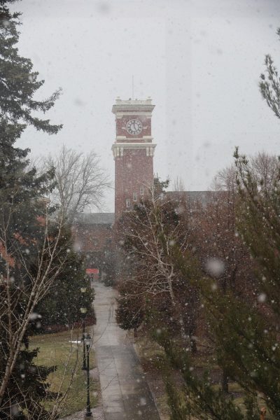 The Bryan Clock Tower can be seen through flurries of snowflakes