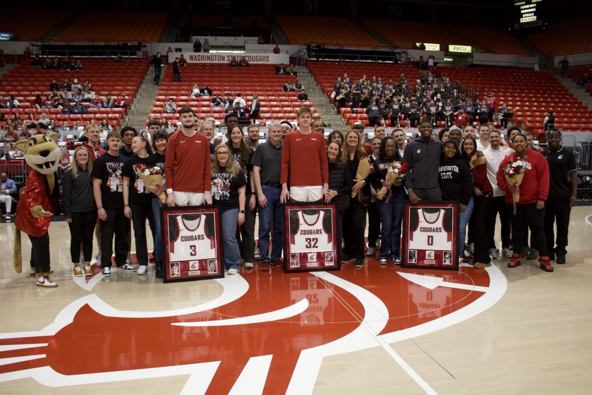 Ethan Price, Dake Erikstrup, and Cedric Coward are honored at WSU's senior night on Feb. 27 in Pullman, Wash. 