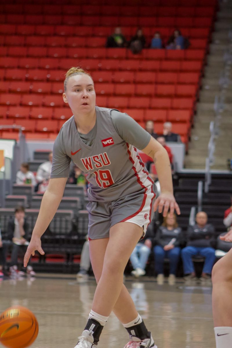 Guard Charlotte Abraham drives against Saint Mary's on Feb. 22 in Pullman, Wash.