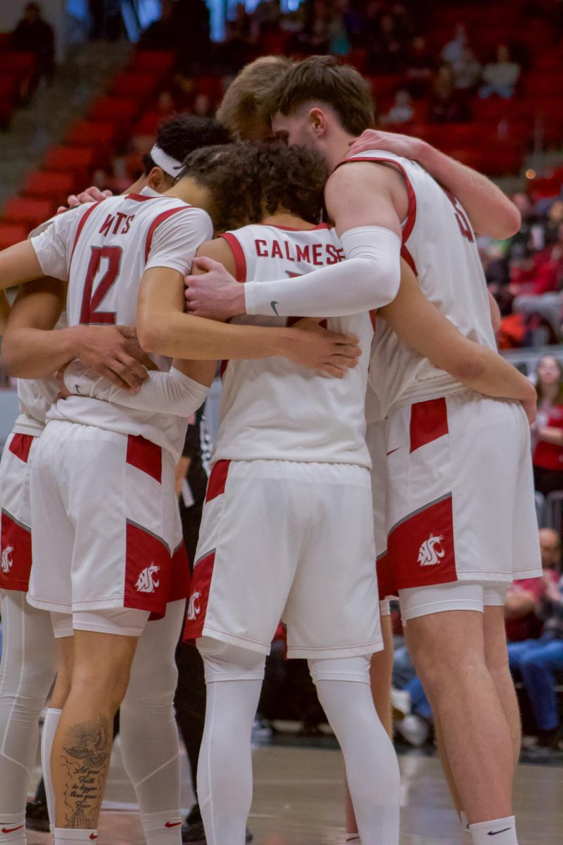 The Cougar men's starting lineup huddles up against Pepperdine on Feb. 8, 2024, in Pullman, Wash.