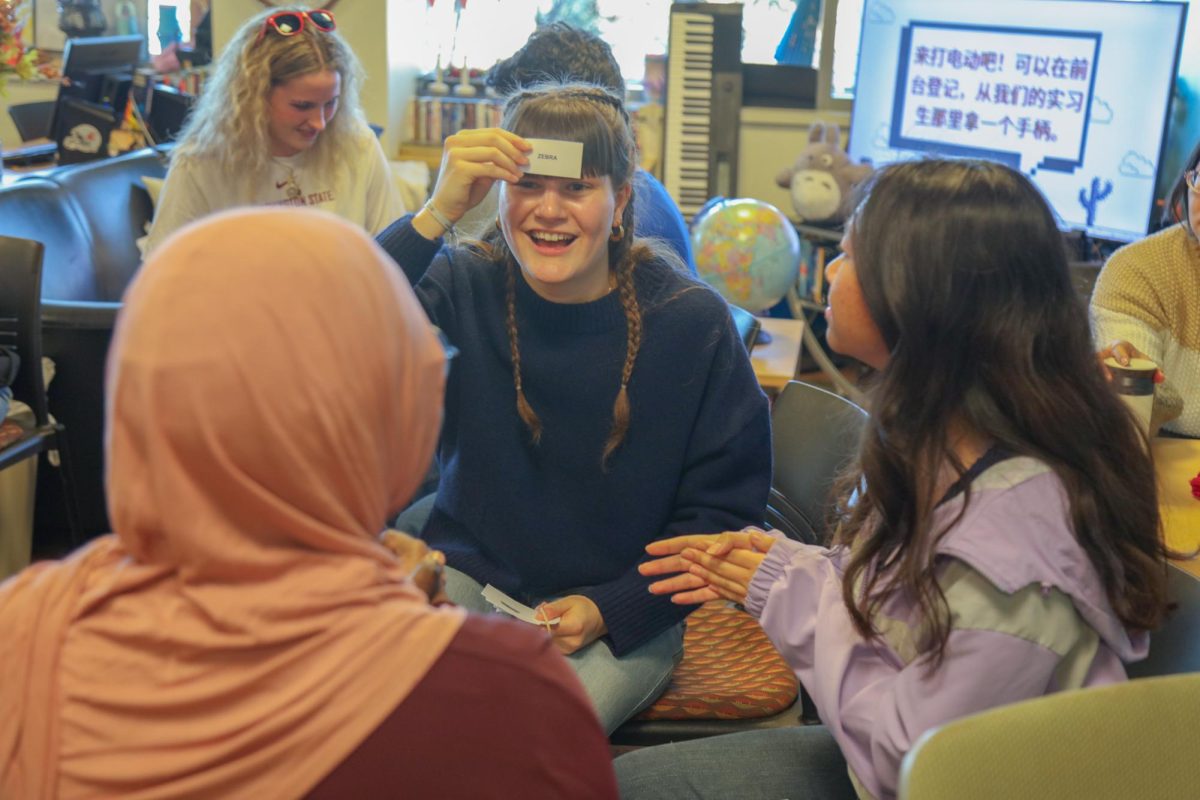 International students participated in an activity at the "Coffee Hour" series with the women's basketball team on Feb. 28, at the International Center at WSU.