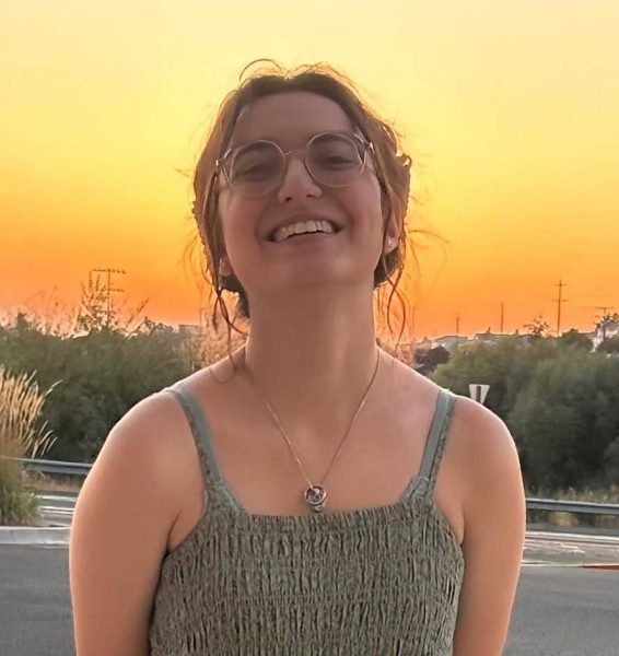 ALLIE OZMUN-WELLS