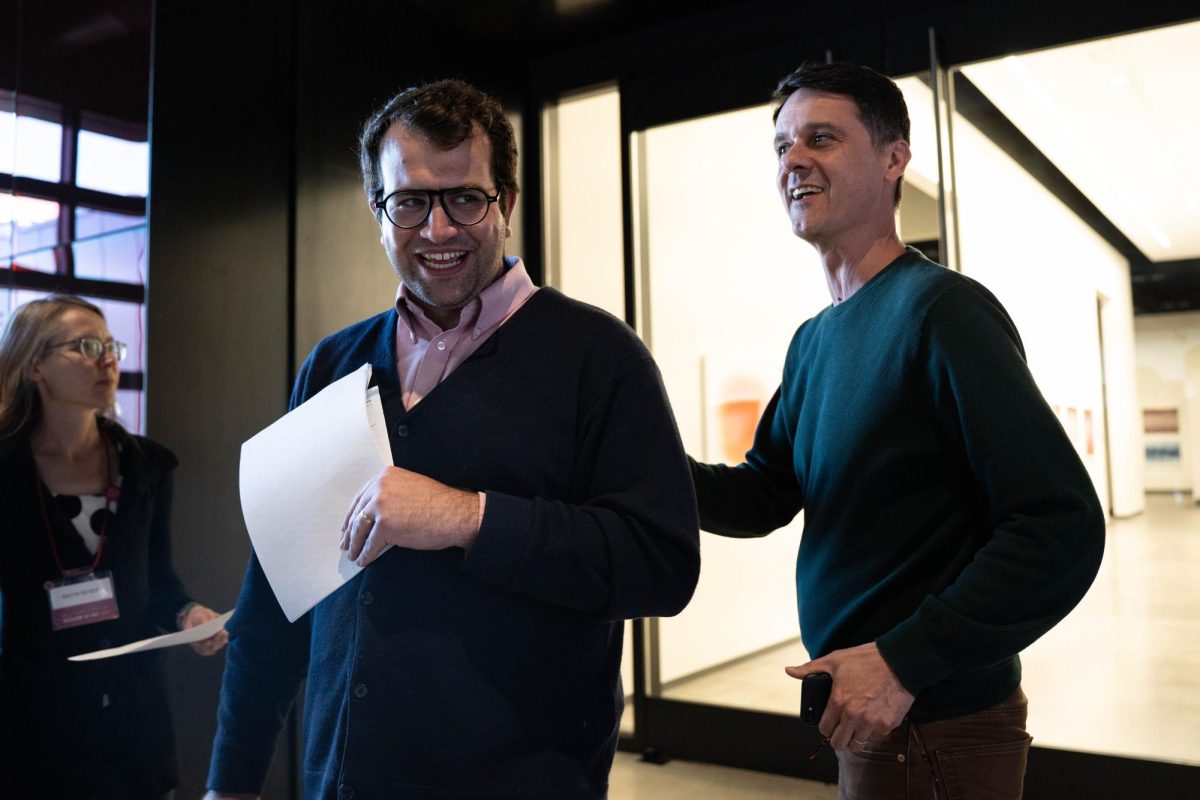 Washington State University Professor Colin Criss, left, leads a Community Perspectives Exhibitions Tour at the Jordan Schnitzer Museum of Art on Thursday, Oct. 9. 