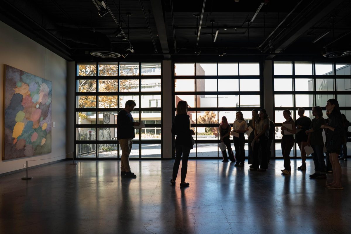 Washington State University Professor Colin Criss leads a Community Perspectives Exhibitions Tour at the Jordan Schnitzer Museum of Art on Thursday, Oct. 9. 