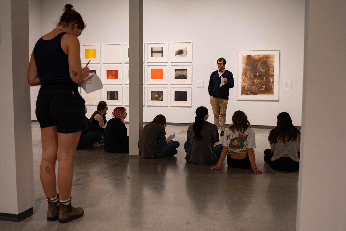 Washington State University Professor Colin Criss leads a Community Perspectives Exhibitions Tour at the Jordan Schnitzer Museum of Art on Thursday, Oct. 9. 