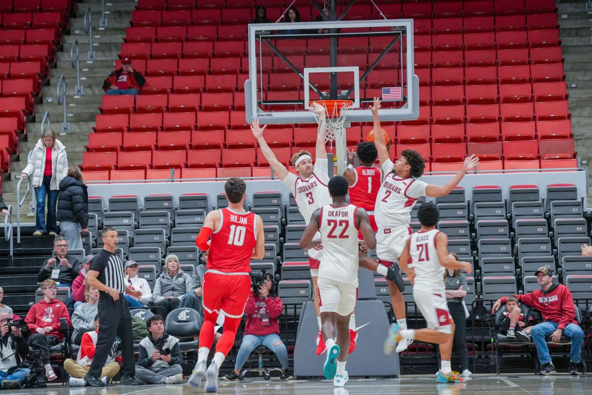 WSU Forwards Eemeli Yalaho and Simon Hildebrandt going for a block against New Mexico Guard Deyton Albury, Oct. 25
