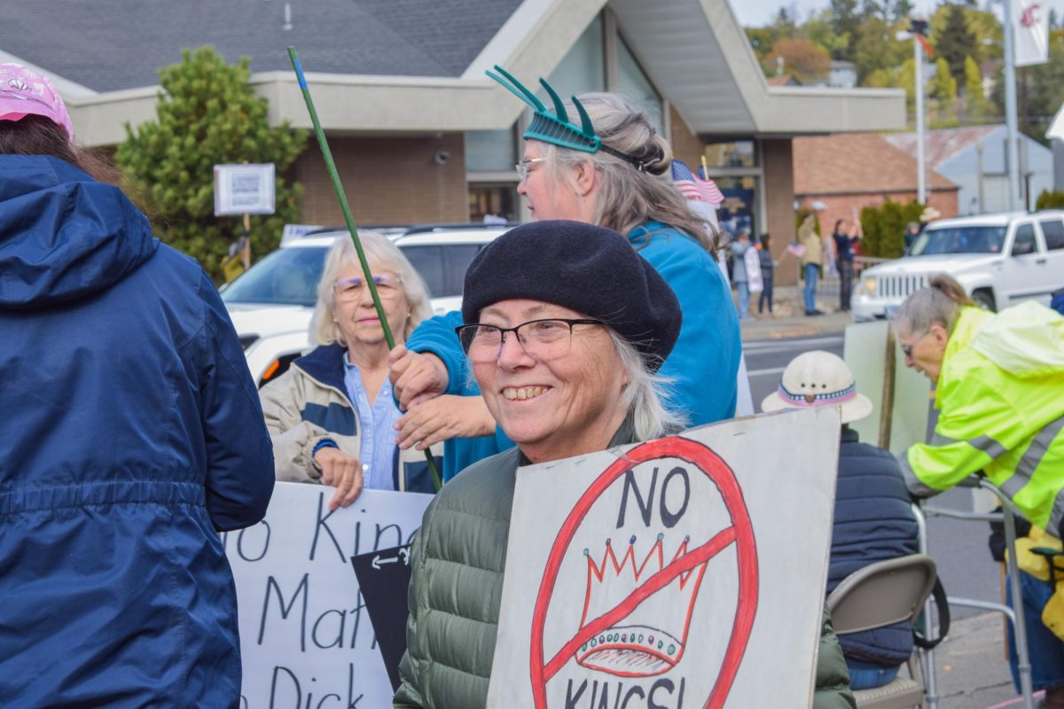 Protesters join together at the 'No Kings' rally hosted in downtown Pullman, Oct. 18