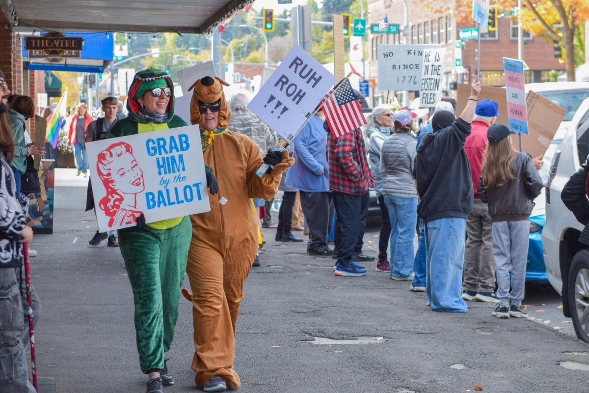 Protesters join together at the 'No Kings' rally hosted in downtown Pullman, Oct. 18