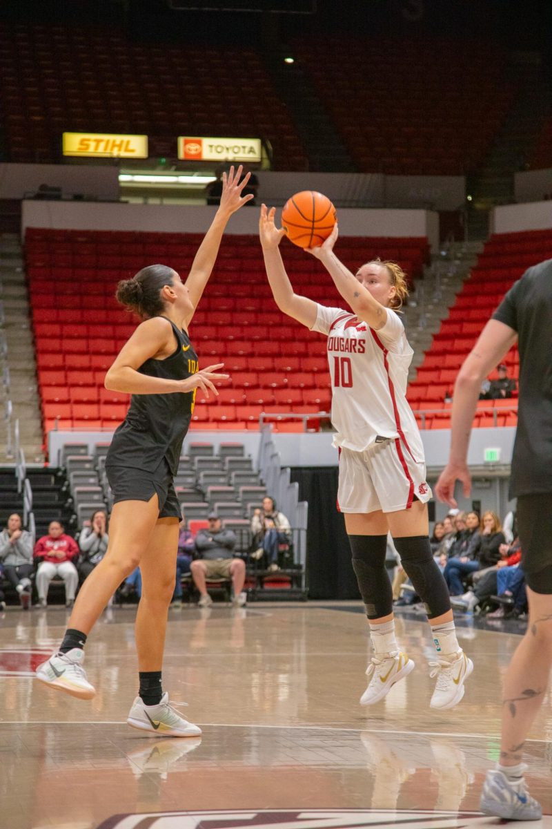 WSU Guard Charlotte Abraham shoots from the three-point line against University of Idaho, Nov. 3