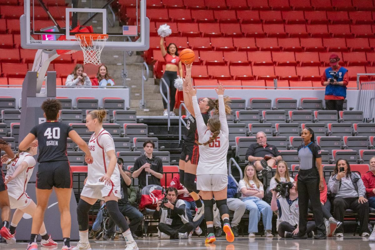 WSU Forward Malia Ruud defends a shot from Stanford Forward Lara Somfai, Nov. 14, 2025