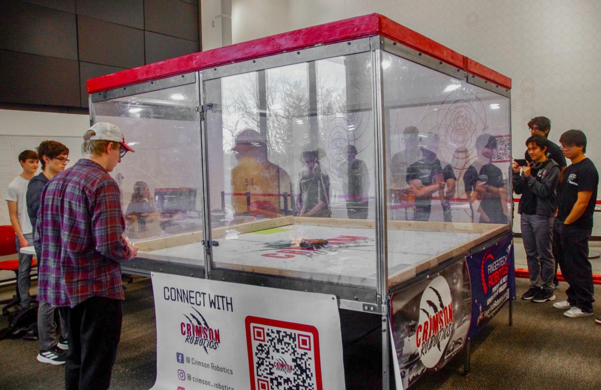 Sparks fly as robots clash during the Crimson Bot-Brawl, Nov. 15, 2025