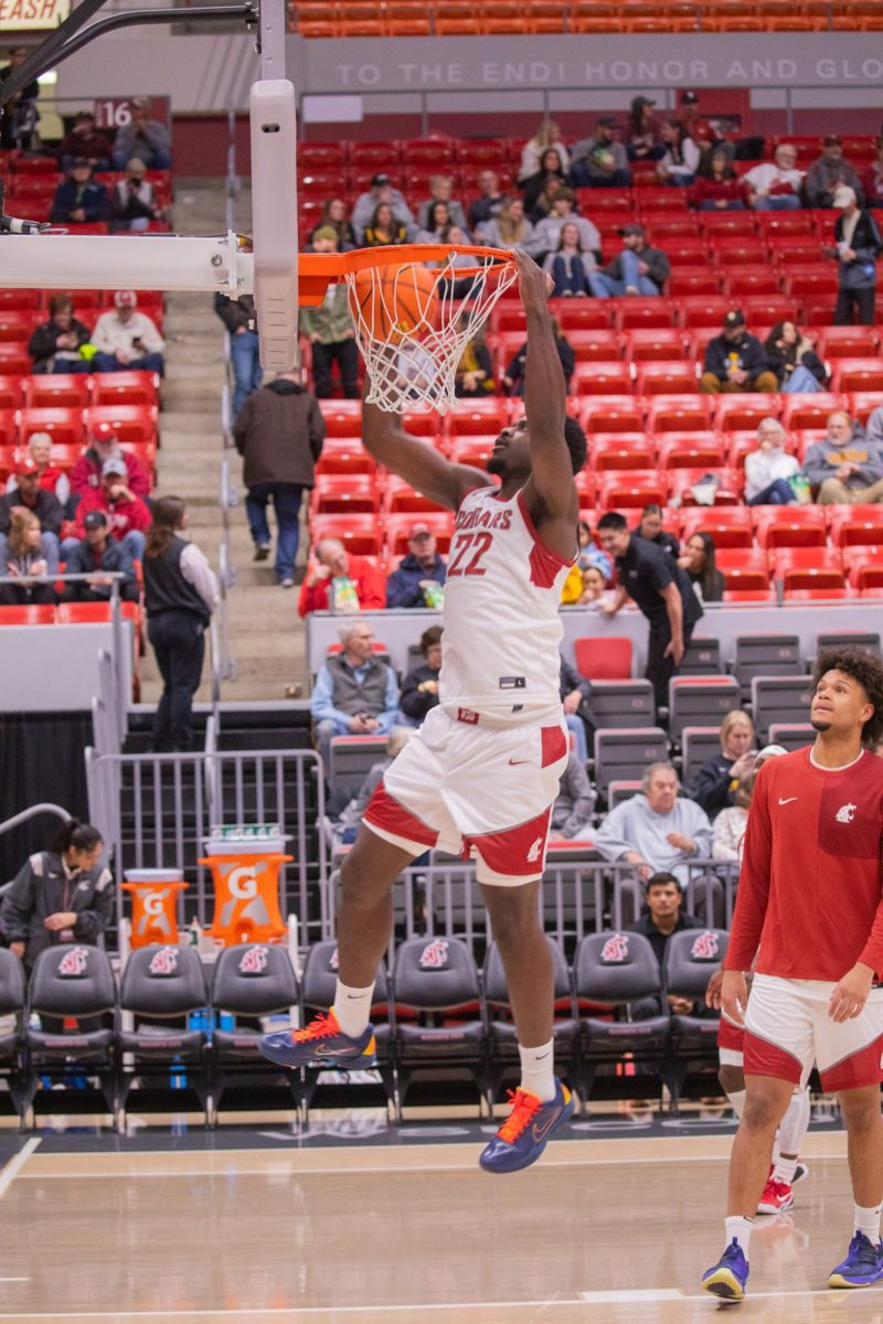 WSU Forward ND Okafor dunks the ball during warm ups for the game against University of Idaho, Nov. 3rd.