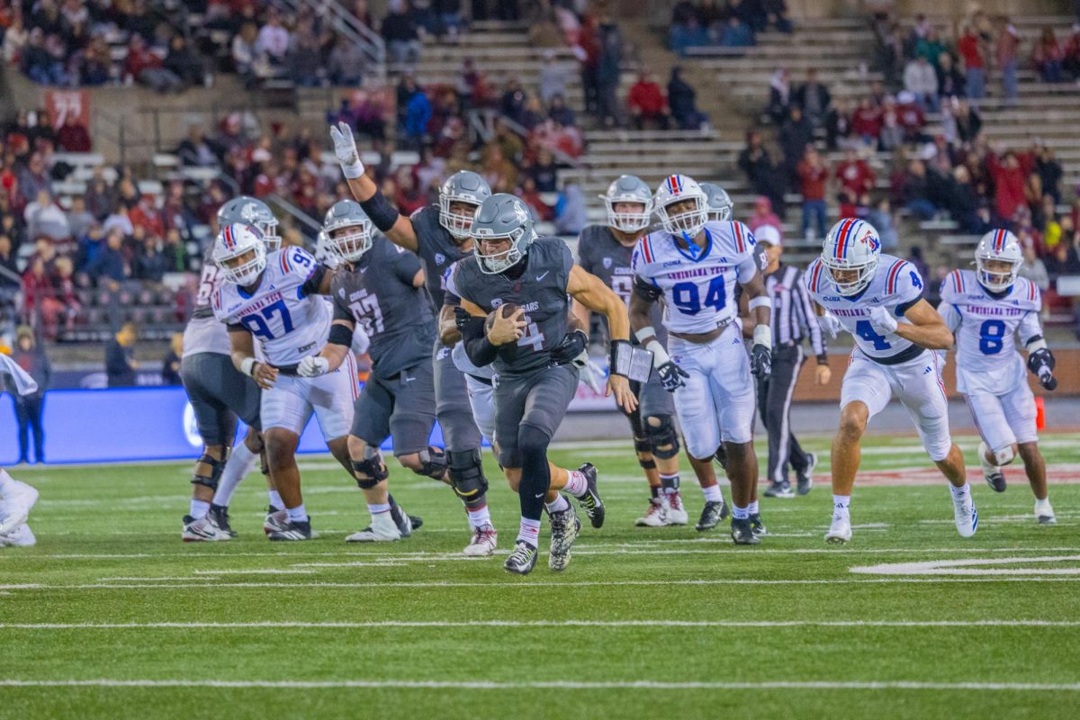 WSU Quarterback Zevi Eckhaus breaks through LA Tech's defense, Nov. 15, 2025
