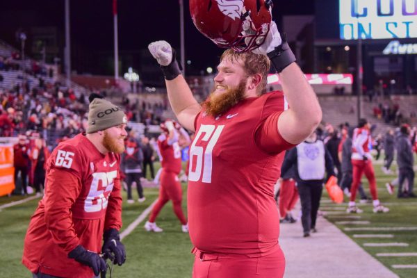 WSU Offensive Line Christian Hilborn celebrating the WSU victory against OSU, Nov. 30, 2025