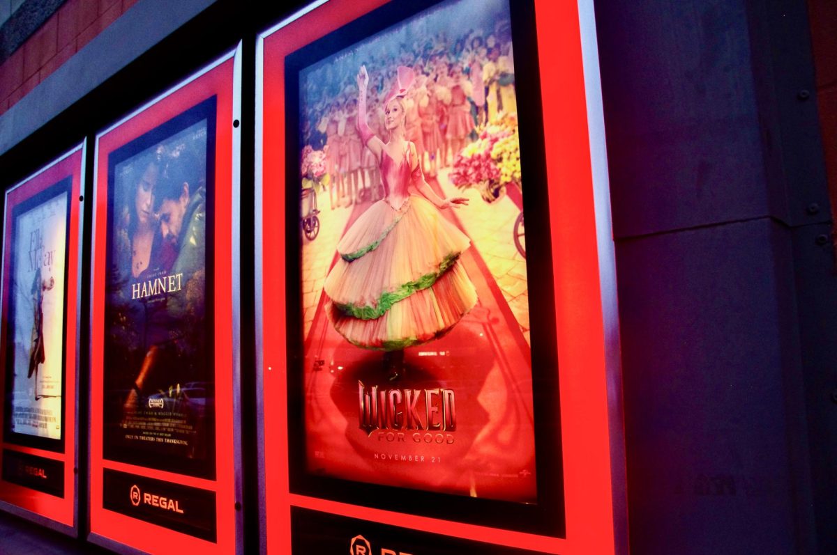 Wicked: For Good movie poster outside the Regal Longston Place theater, Nov. 23