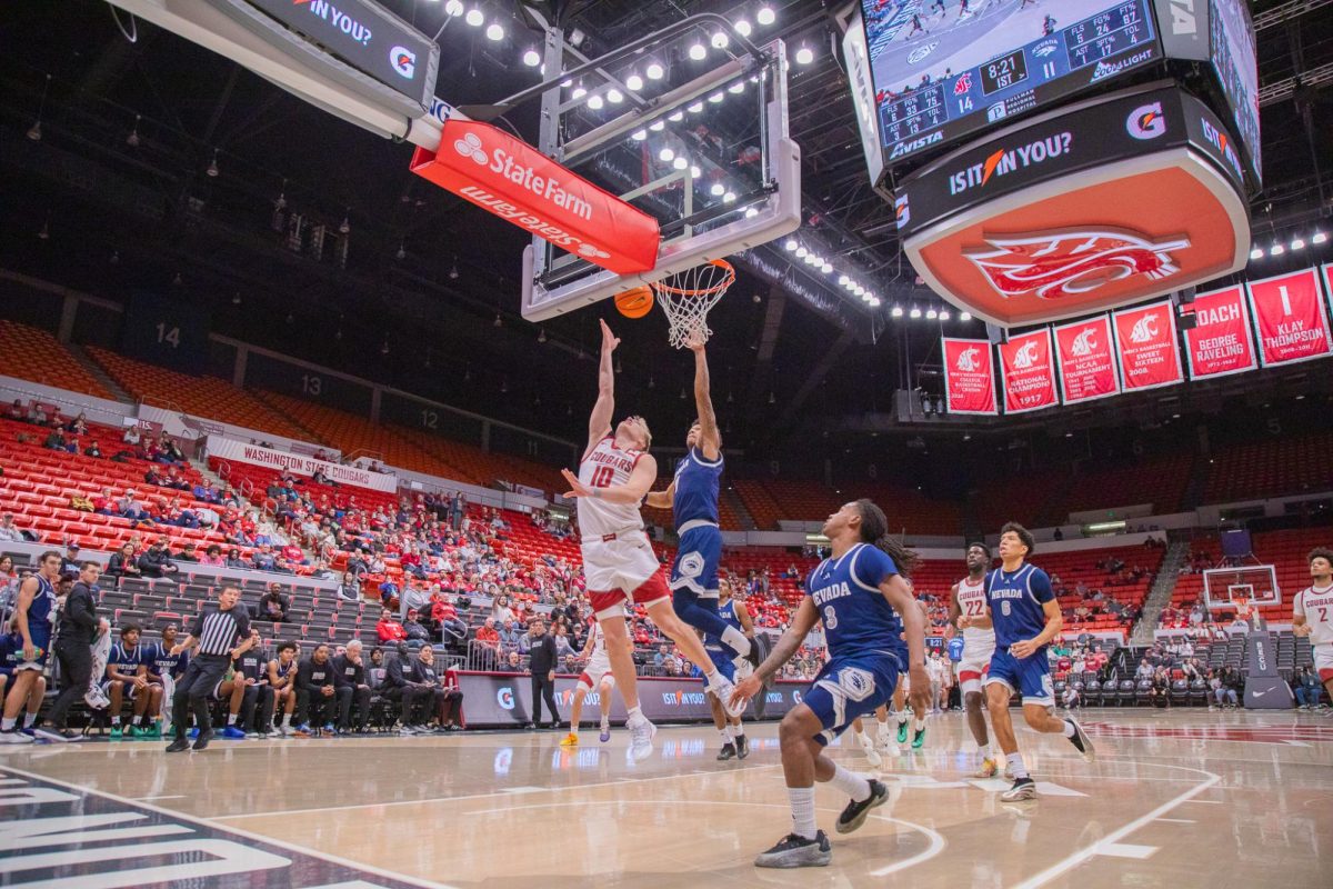 WSU Guard Parker Gerrits goes in for a layup against University of Nevada, Dec. 7, 2025