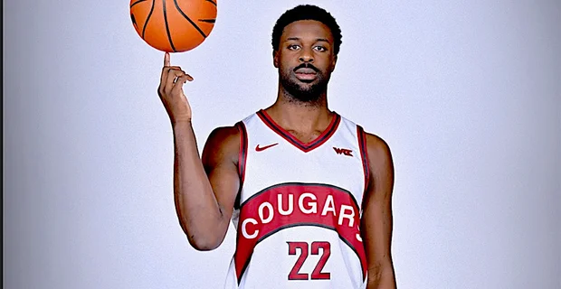 ND Okafor posing in the Cougs' new retro jerseys for 2026 (Courtesy of WSU Athletics on Twitter). 