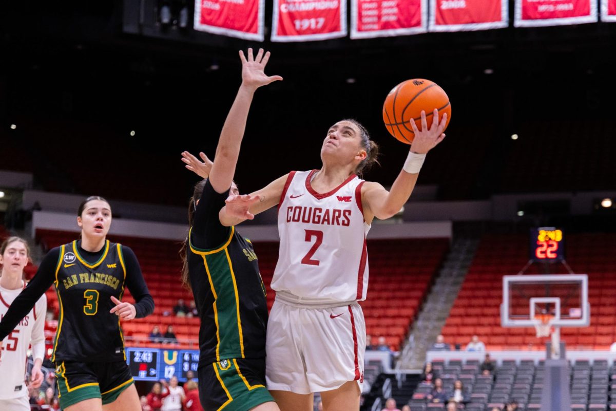 WSU Guard Eleonora Villa reaches for a layup against University of San Francisco defenders, Jan. 17, 2026
