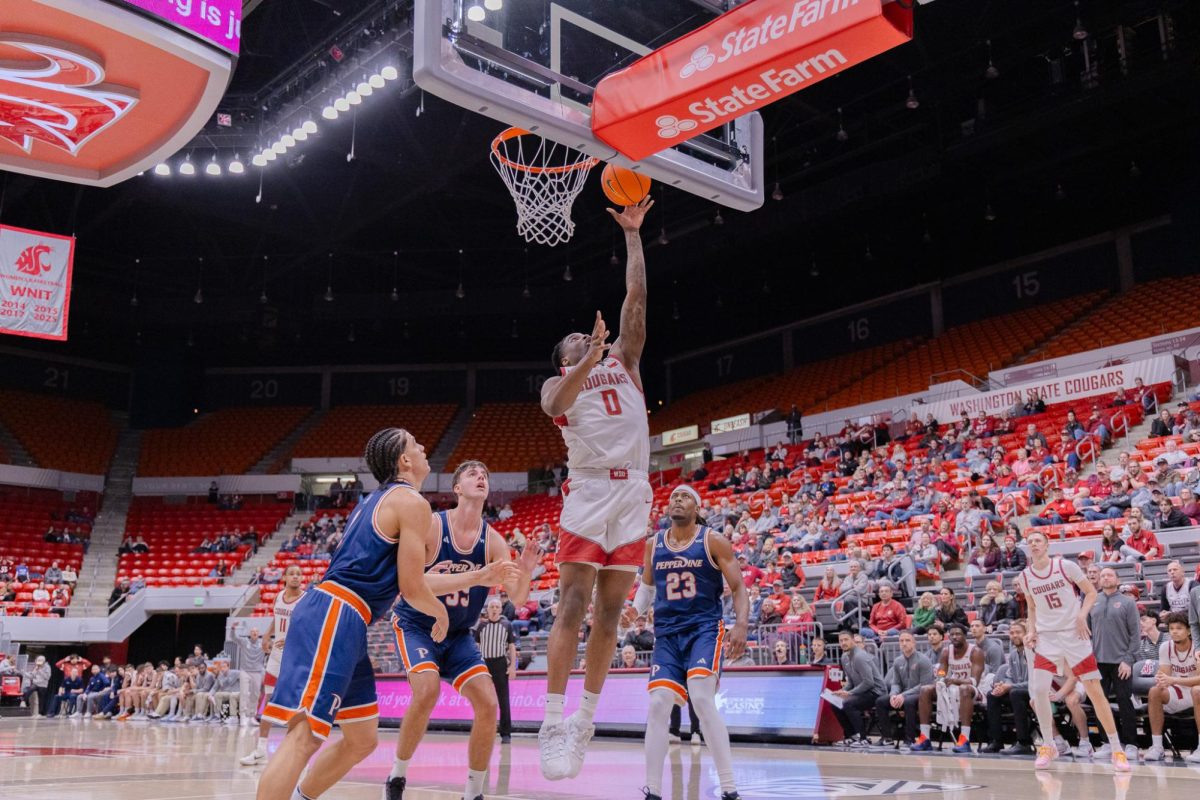WSU Forward Emmanuel Ugbo makes a layup against Pepperdine University, Jan. 24, 2026.