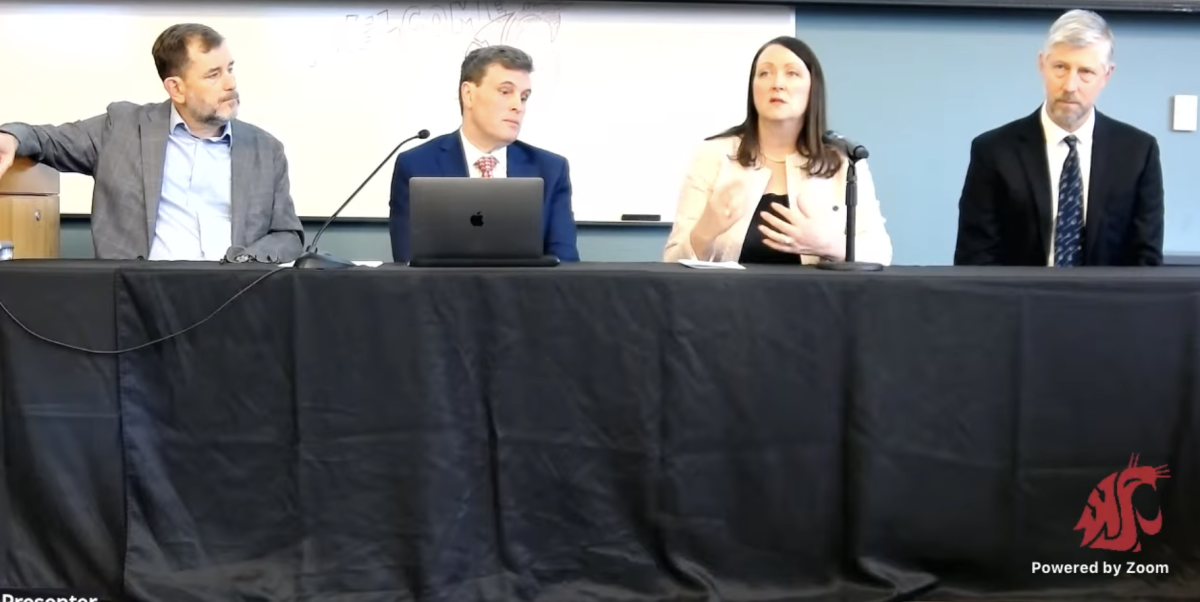 A Panel of presenters, including university Provost and Vice President Chris Riley-Tillman give a presentation on health sciences for the Pullman community. 