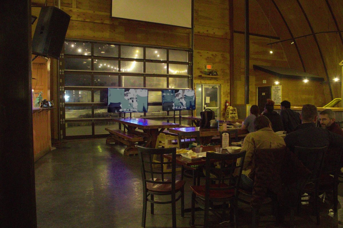 Customers watch football in the Lumberyard on its last open Sunday. Jan. 25, 2026, Pullman, WASH