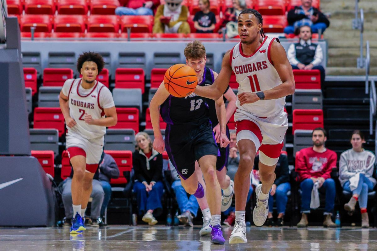 WSU Guard Jerone Morton takes the ball down the court against Portland, Jan. 31, 2026.