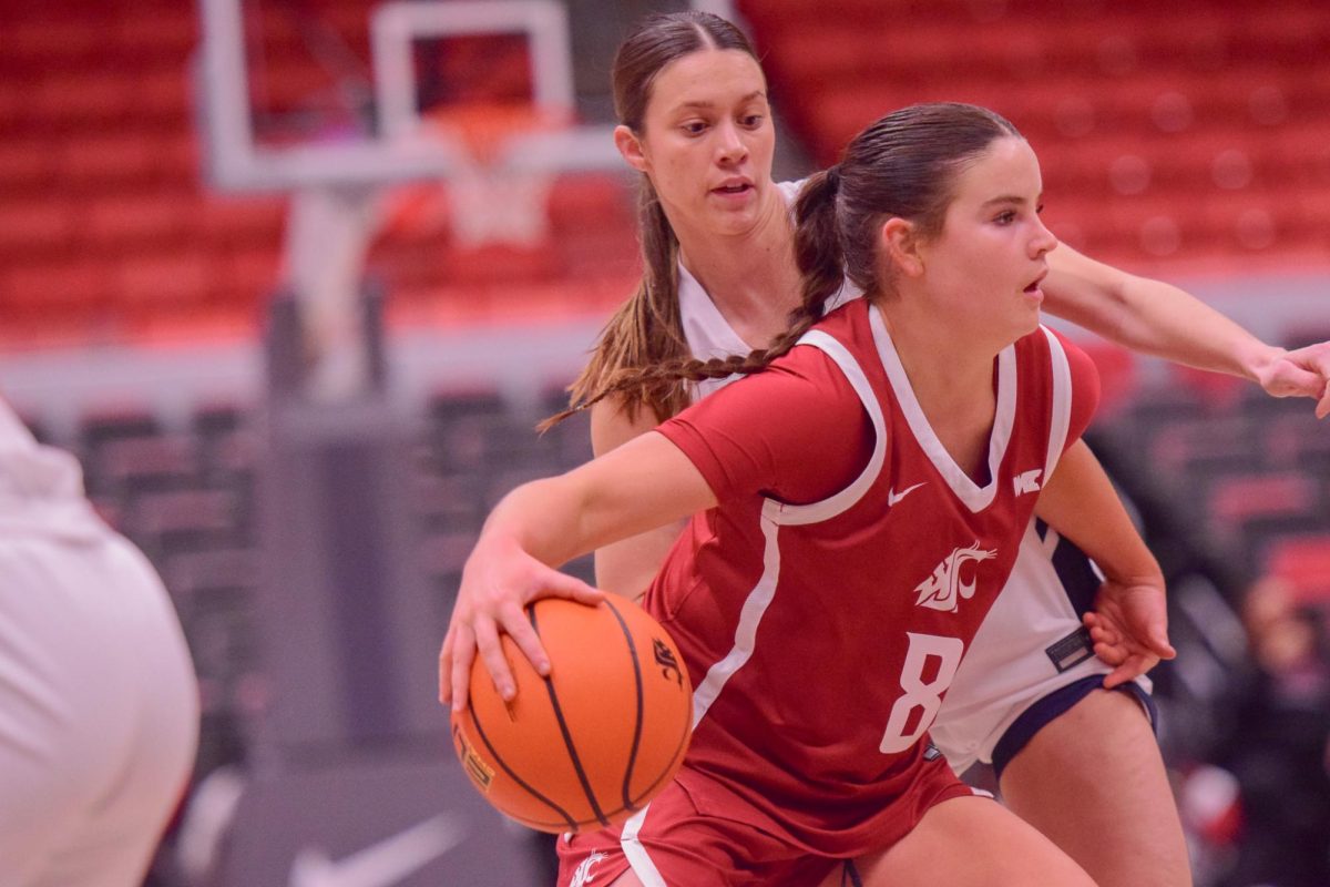 WSU Forward Lauren Glazier reaches to block the ball against Gonzaga University, Jan. 31, 2026.