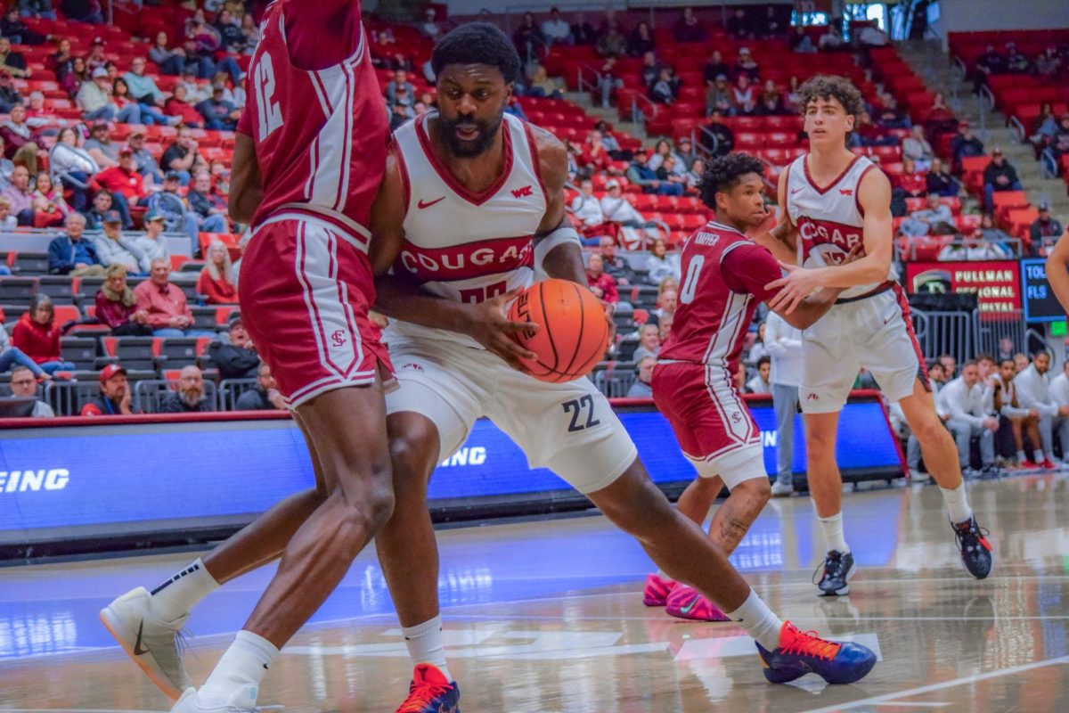 WSU Forward ND Okafor pushing towards the basket against Santa Clara University's defense, Feb. 7, 2026.
