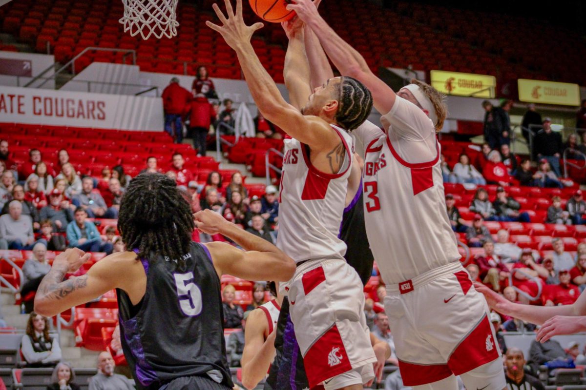 WSU Forward Simon Hildebrandt and Guard Ace Glass block a Portland score, Jan. 31, 2026.