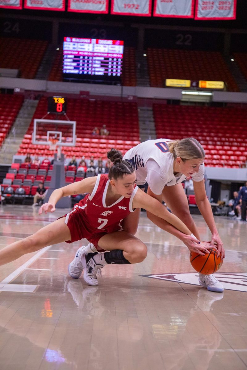 WSU Guard Eleonora Villa dives for the ball against Gonzaga University, Jan. 31, 2026.