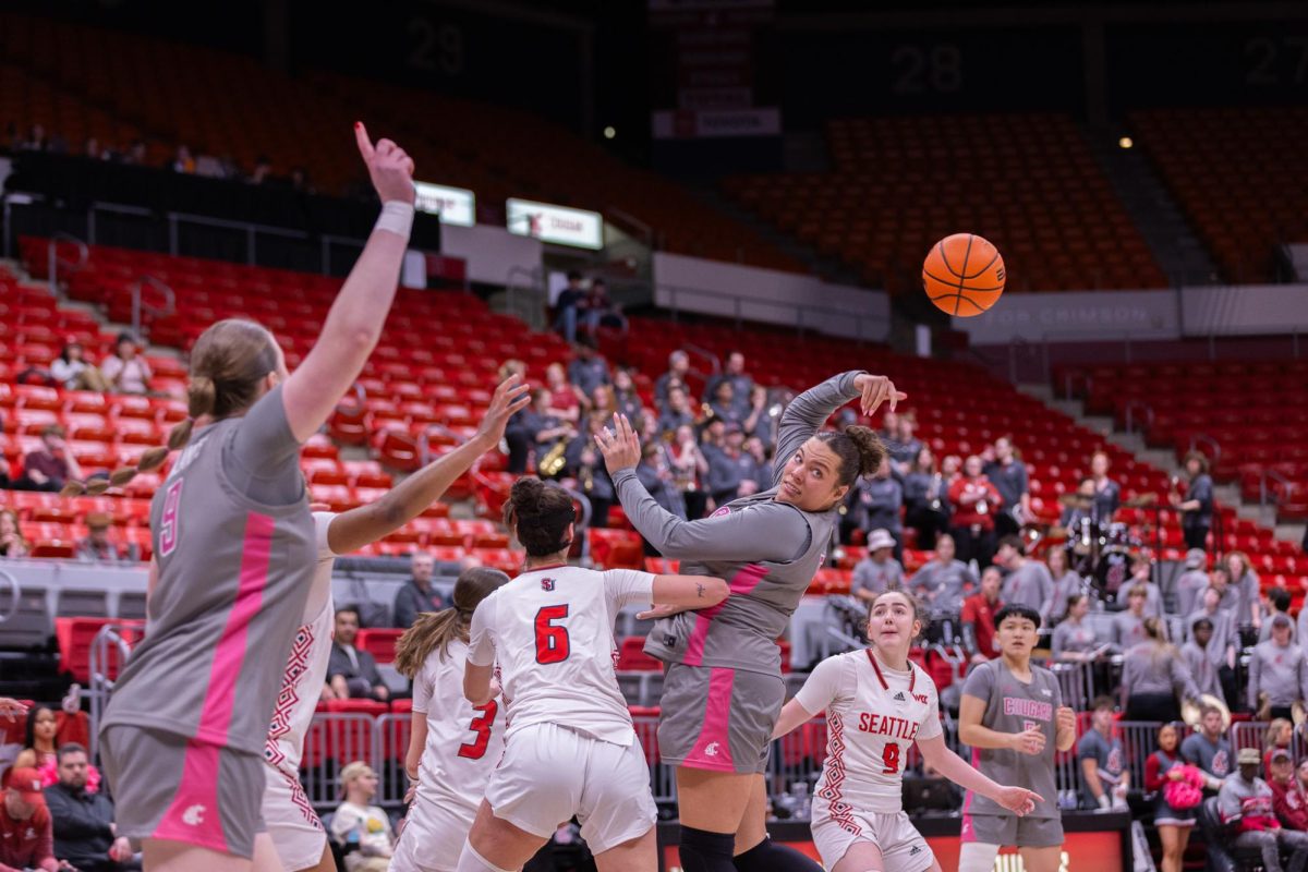 WSU Forward Malia Ruud makes an overhead pass against Seattle University, Feb. 26, 2026.