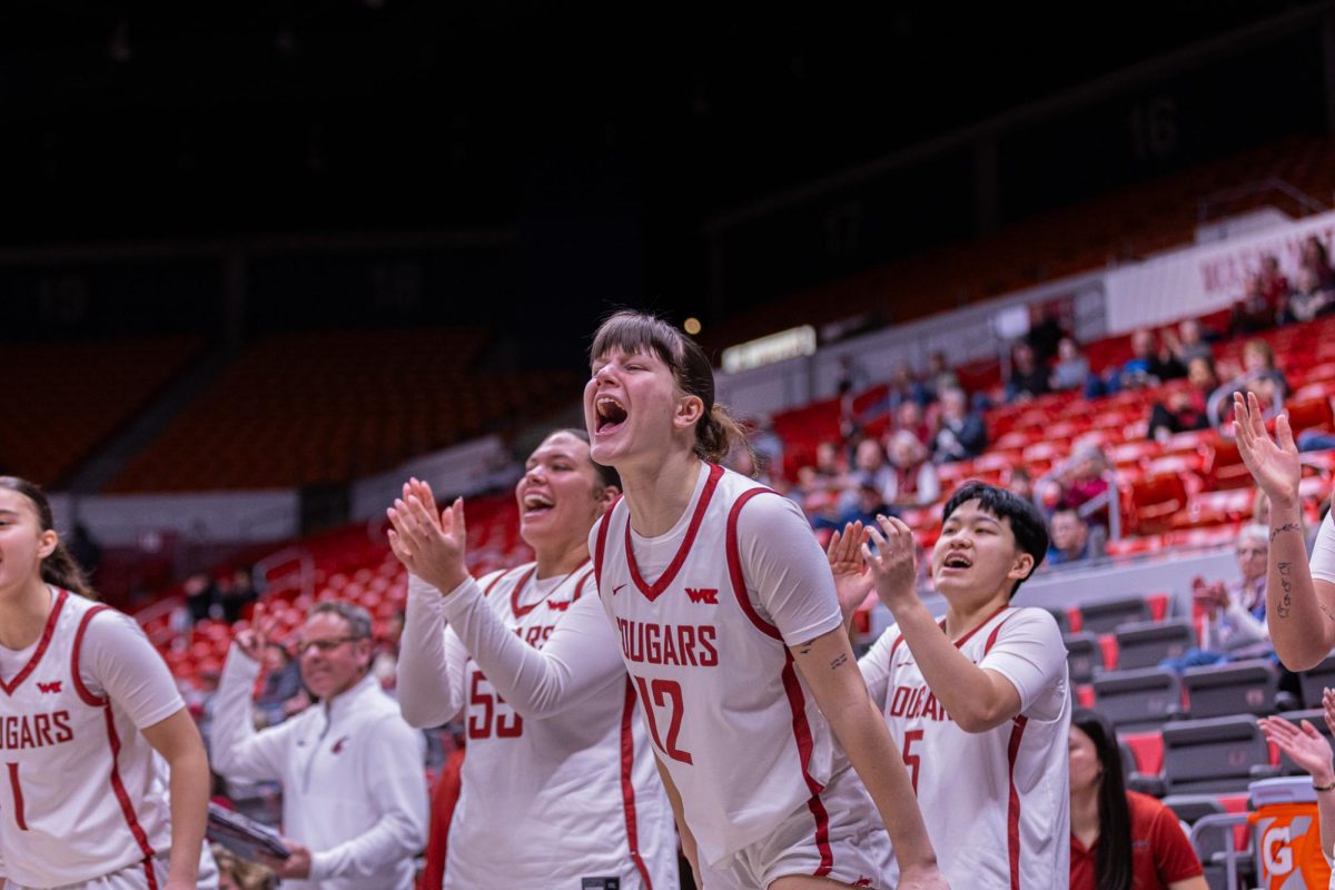 WSU Guard Marta Alsina cheering for her team from the sidelines against University of Portland, Feb. 12, 2026.