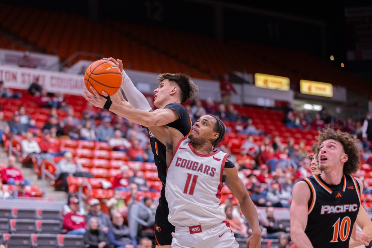 WSU Guard Jerone Morton reaches to steal the ball against University of the Pacific, Feb. 18, 2026.