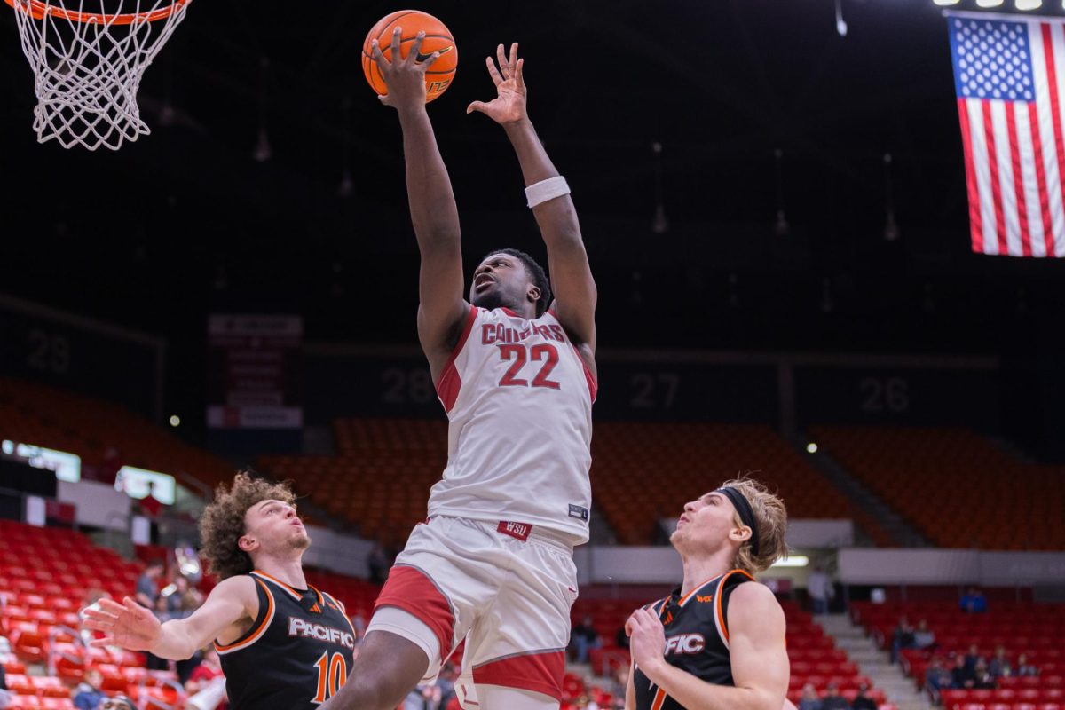 WSU Forward ND Okafor leaps for a shot against University of the Pacific, Feb. 18, 2026.