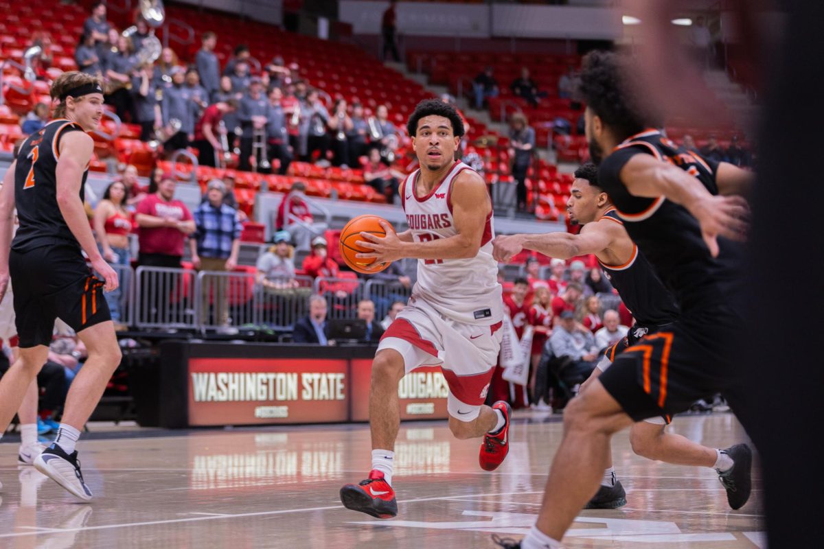 WSU Guard Ace Glass takes the ball up the court against University of the Pacific, Feb. 18, 2026.