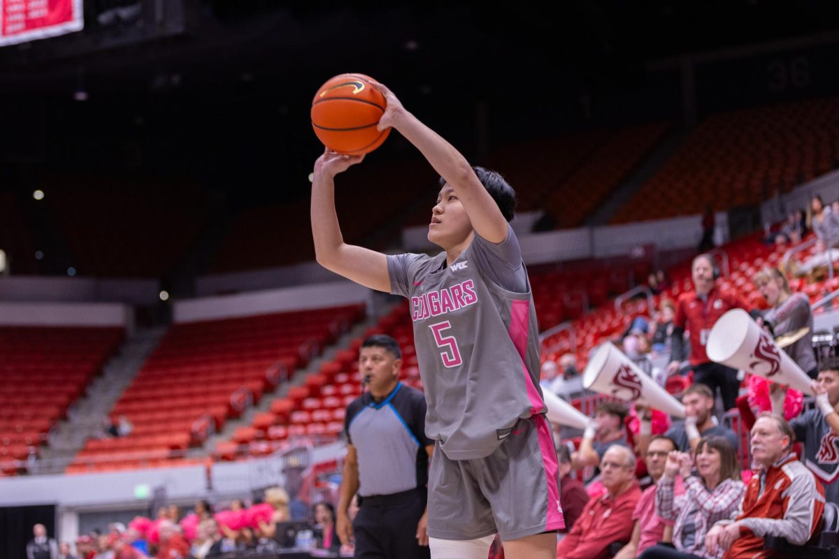 WSU Guard Jean Chiu shooting the ball against Seattle University, Feb. 26, 2026.