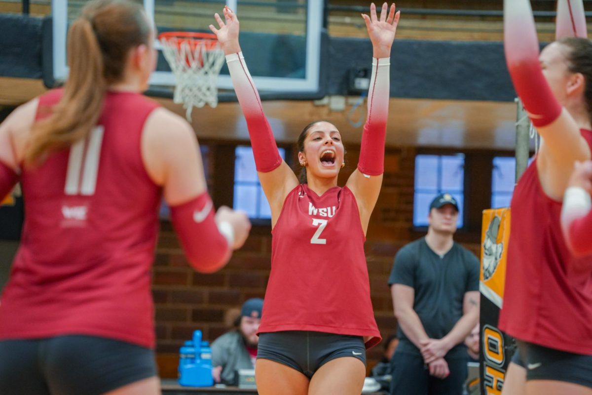 WSU Outside Hitter Madyn Cervellera cheering after a score against University of Idaho, March 7, 2026.
