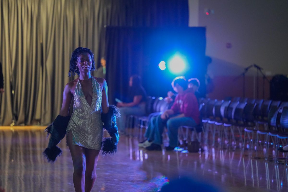 A model on the walkway of the SEB fashion show in the CUB Sr. Ballroom, March 11, 2026.