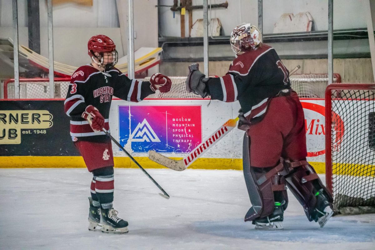 WSU defender Collin Keenan and goalie Cole Eastman share a fist bump during their match against Gonzaga, March 27, 2026.