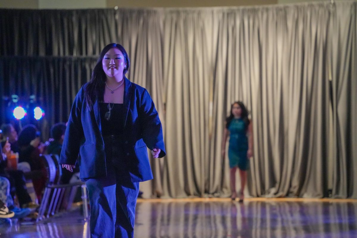 A model on the walkway of the SEB fashion show in the CUB Sr. Ballroom, March 11, 2026.