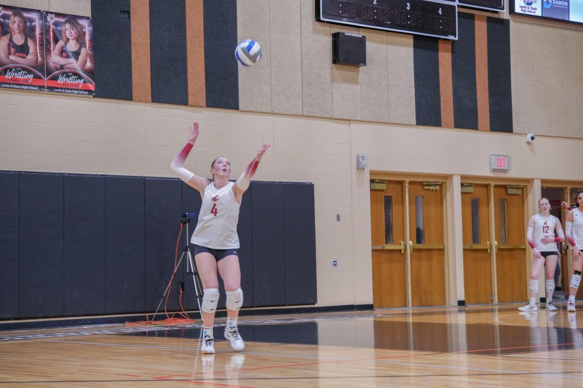 WSU Setter Livia Ward prepares a serve against University of Montana, March 27, 2026.
