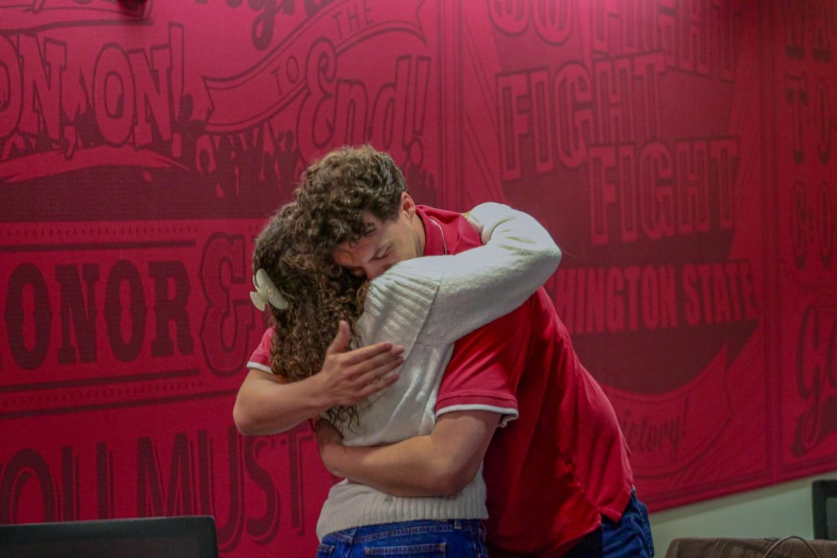 ASWSU Presidential candidate Grace Carpenter and Vice Presidential candidate Reed Scott share a celebratory hug after their winning election results are announced, March 12, 2026.