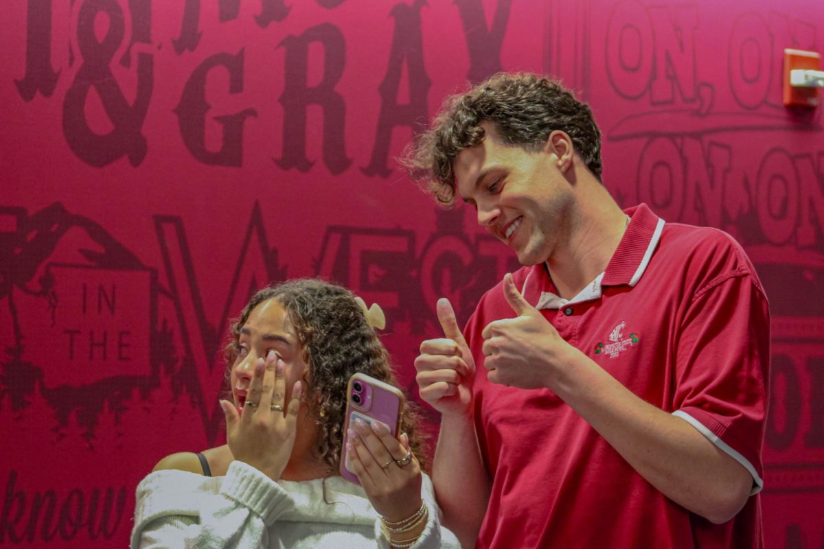 ASWSU Presidential candidate Grace Carpenter and Vice Presidential candidate Reed Scott reacting to their winning election results, March 12, 2026.