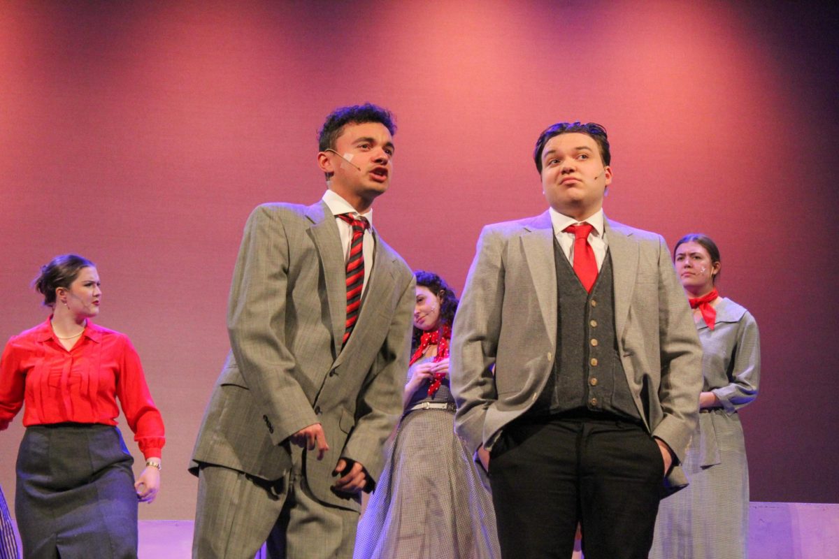 Manny Caldwell (L) and Jack Murdock (R) look out at the audience during a dress rehearsal for "Princess Ida" at Bryan Hall, March 30, 2026