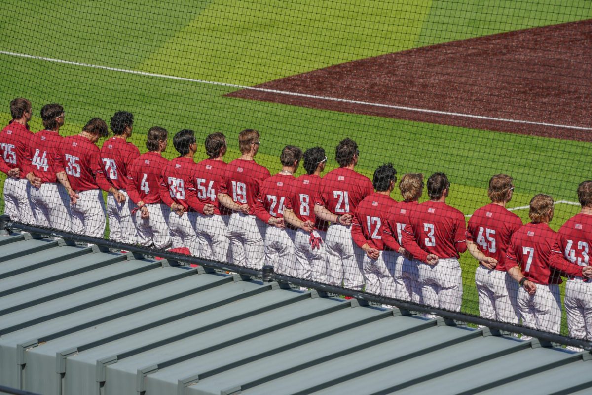 The WSU baseball team lined up for the National Anthem before their game against Oregon State University, April 7, 2026.