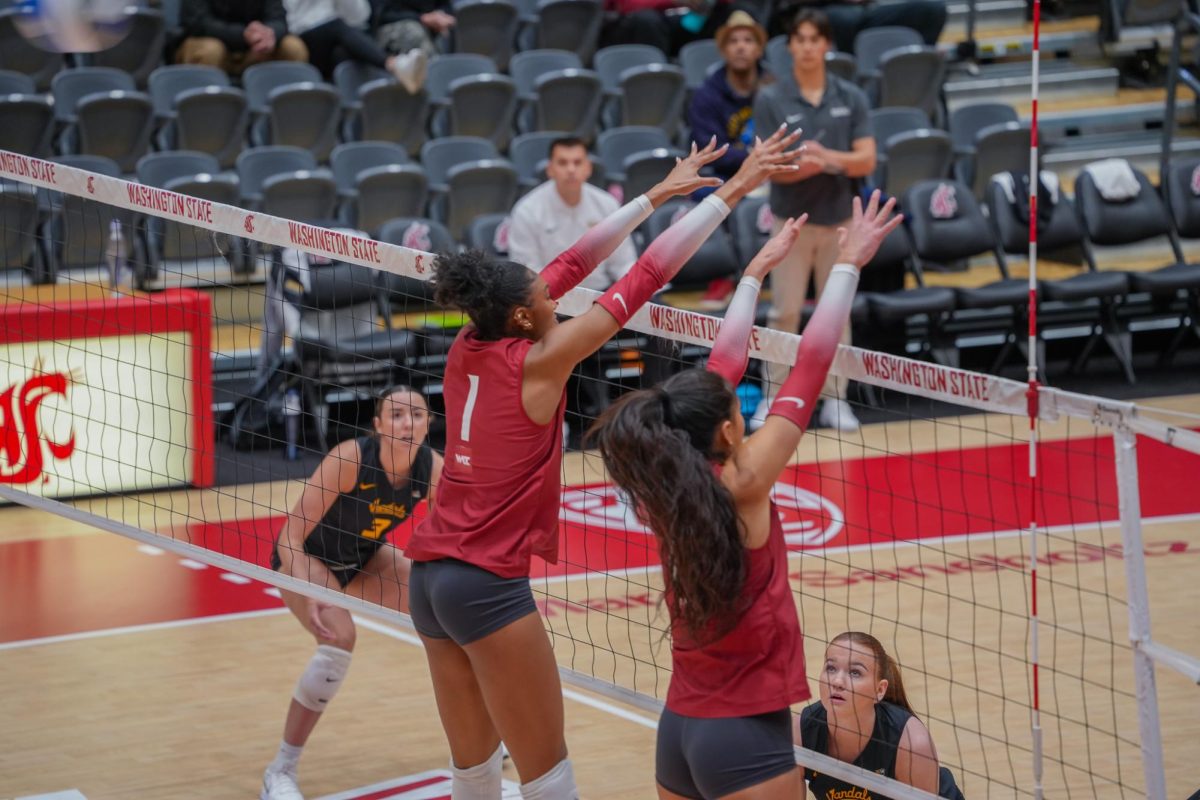 WSU Middle Blocker Naomi White (1) and Outside Hitter Haumea Marumoto (6) going for a block against University of Idaho, April 25, 2026.